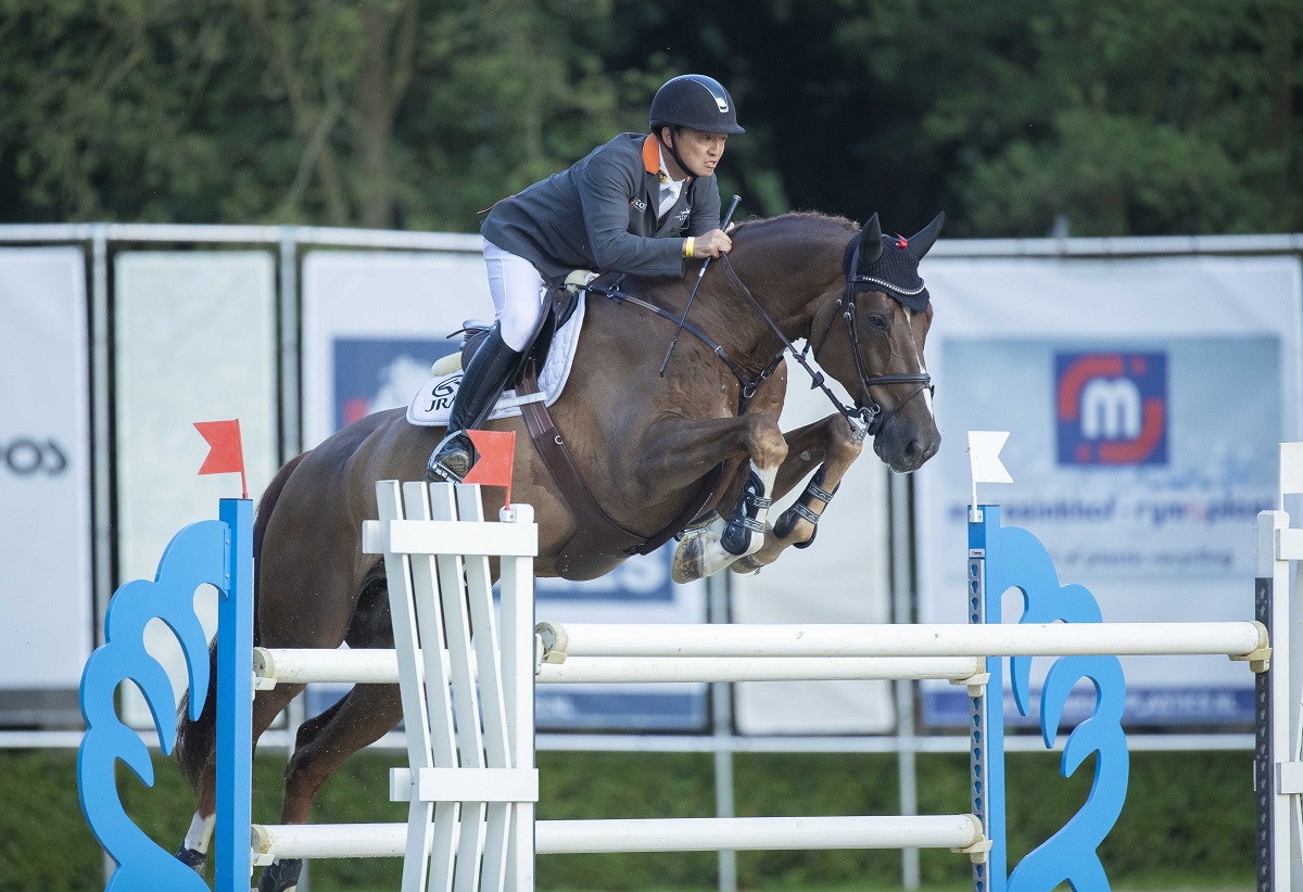 Daisuke Fukushima met de negenjarige Conblue (v. Conthargos) op Outdoor Wierden. Foto FotoTrailer Japanners via Wierden naar Olympische Spelen